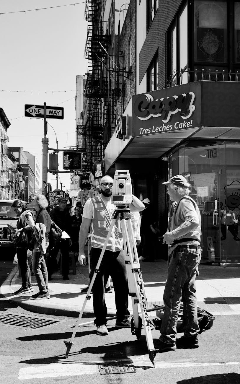 urban surveying in black and white city scene